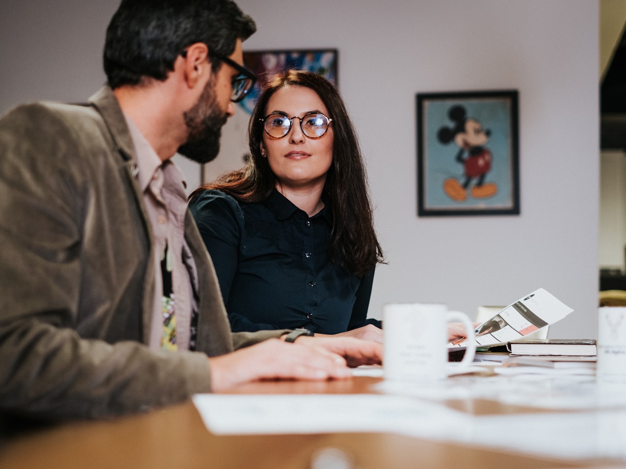Two people working together on a design project.